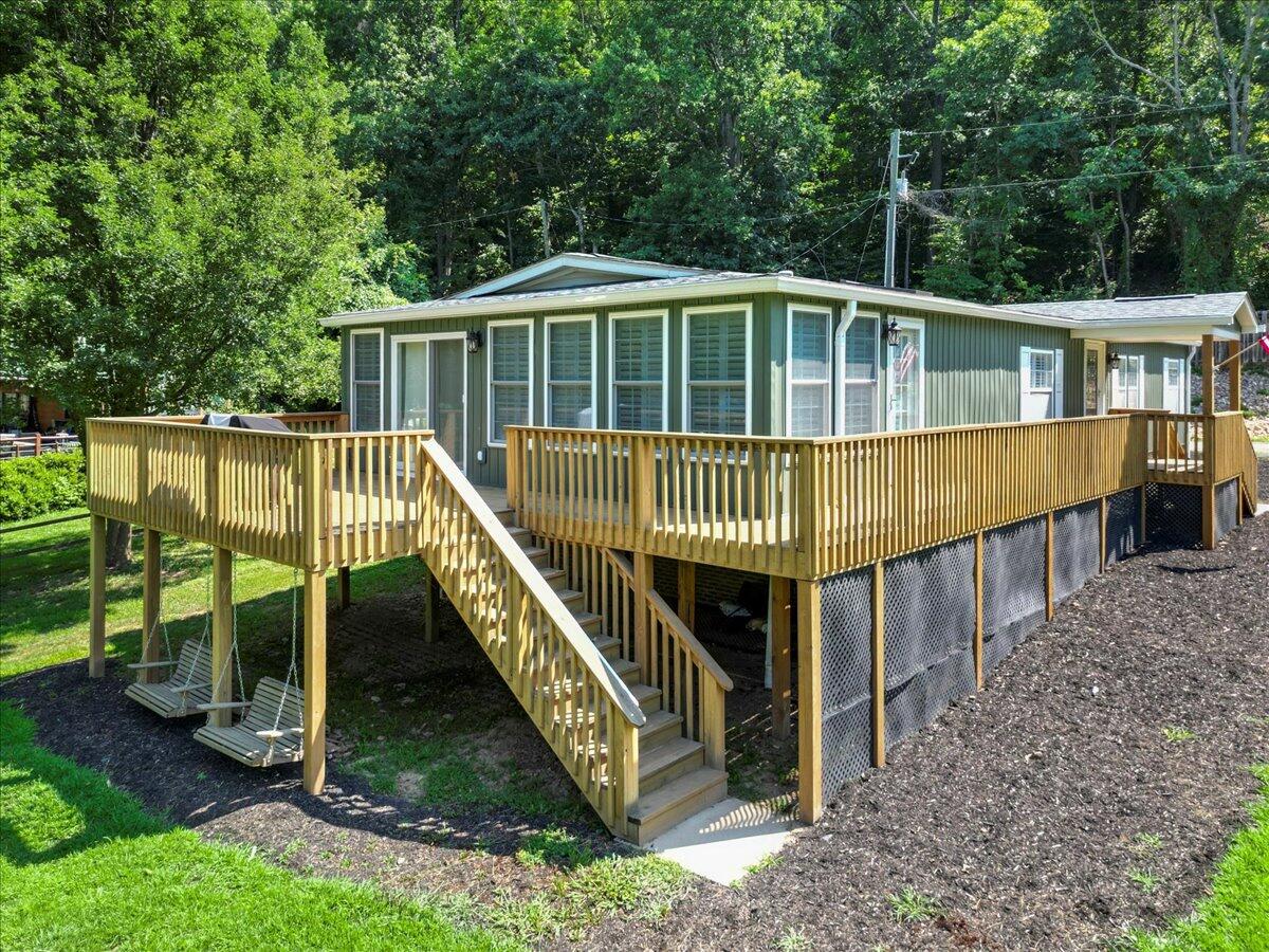3729 Clark Road Hiwassee, VA 24347 - Photo 40 of 52 a view of a house with a deck