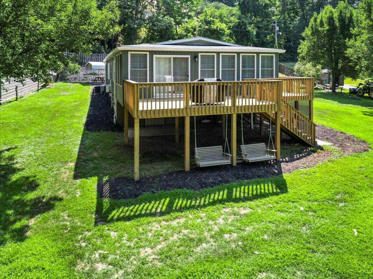 3729 Clark Road Hiwassee, VA 24347 - Photo 41 of 52 a view of a house with a yard porch and sitting area