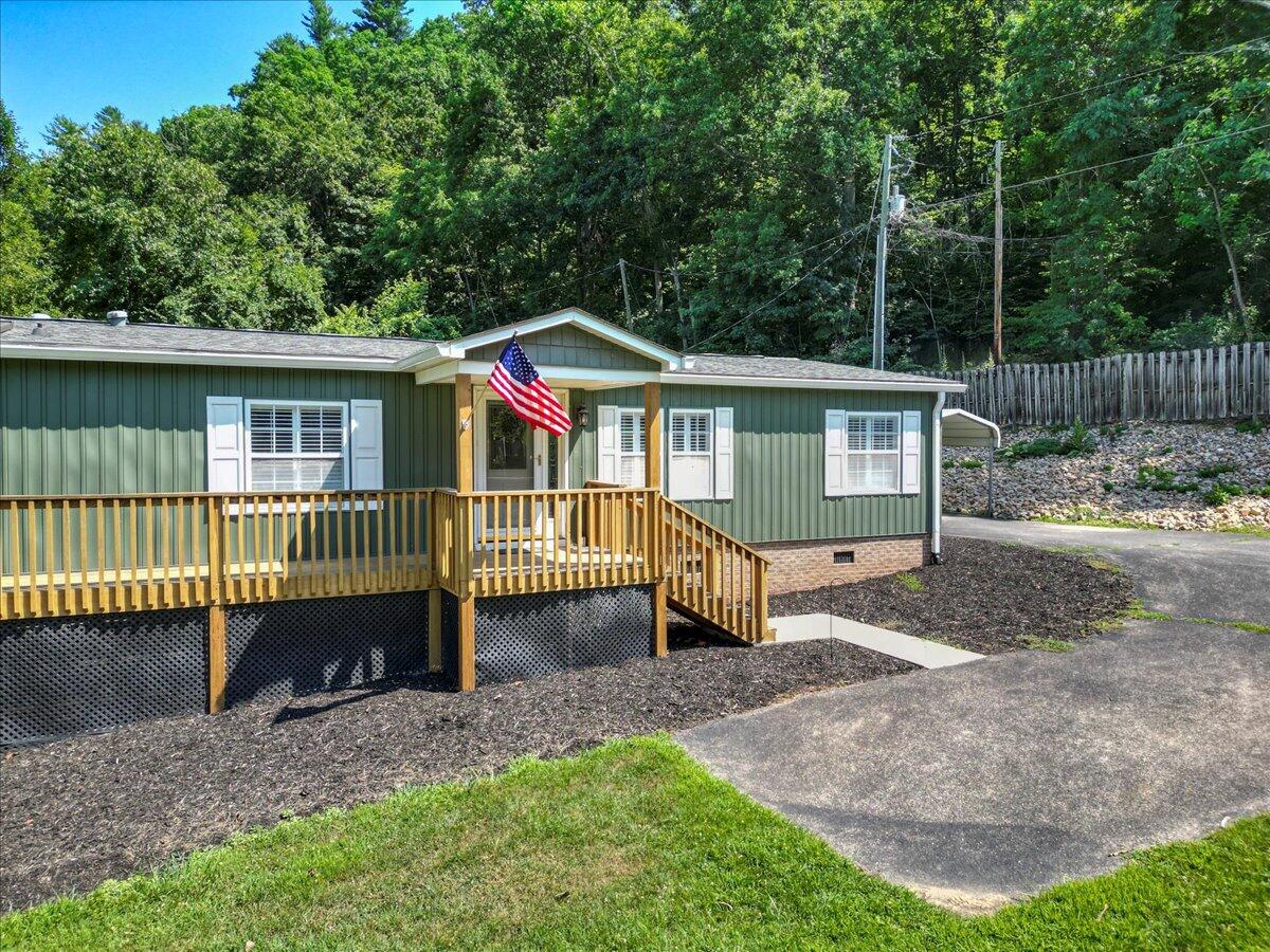 3729 Clark Road Hiwassee, VA 24347 - Photo 43 of 52 a view of a house with a yard and sitting area