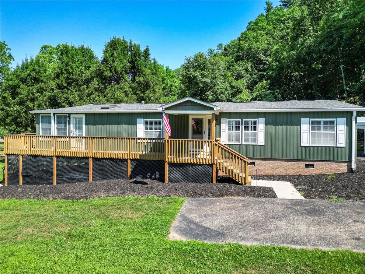 3729 Clark Road Hiwassee, VA 24347 - Photo 44 of 52 a front view of a house with a yard