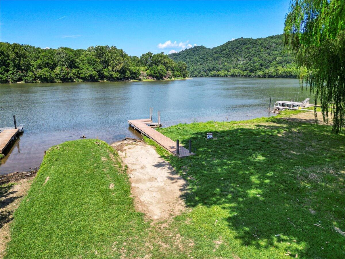 3729 Clark Road Hiwassee, VA 24347 - Photo 49 of 52 a view of a lake with houses in the back