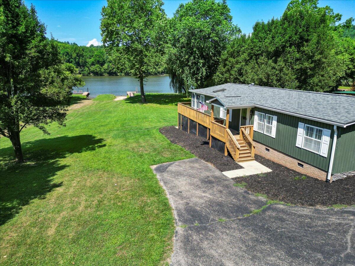 3729 Clark Road Hiwassee, VA 24347 - Photo 6 of 52 a view of a house with a yard