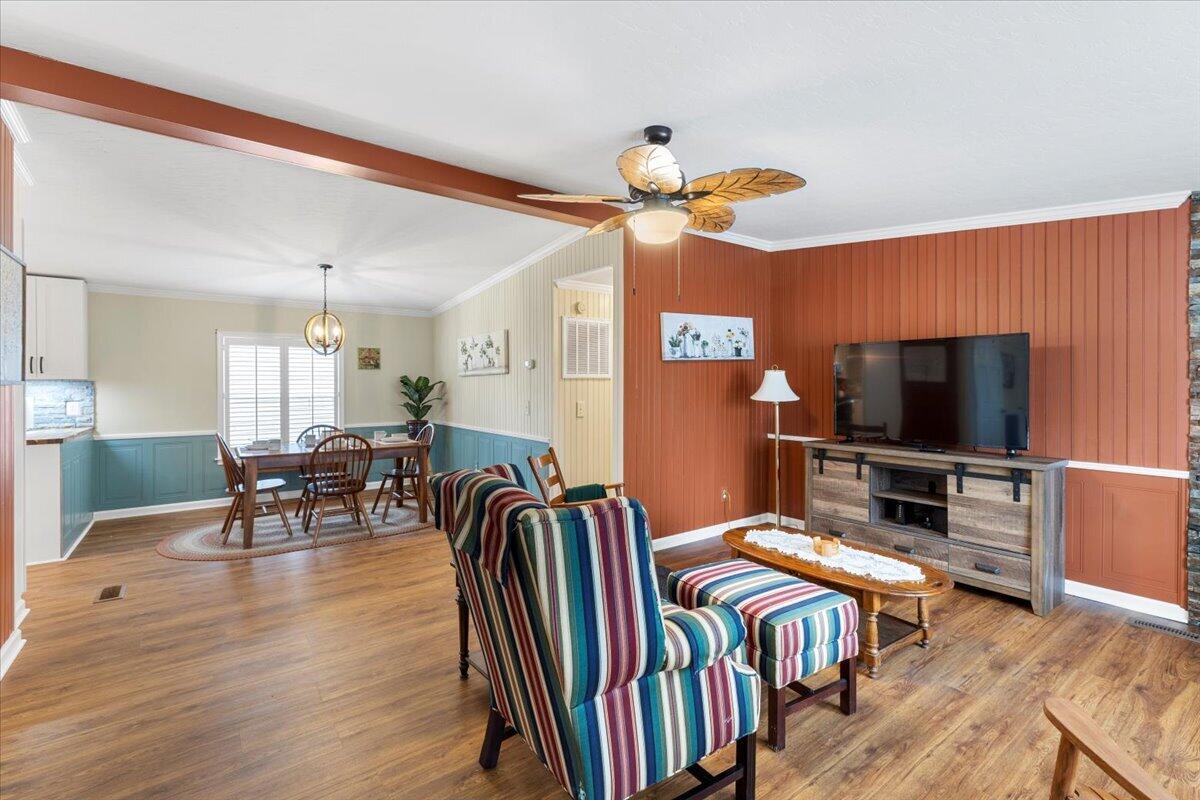 3729 Clark Road Hiwassee, VA 24347 - Photo 7 of 52 a bedroom with furniture and a flat screen tv