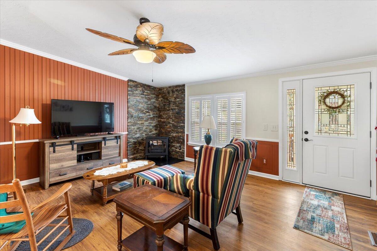 3729 Clark Road Hiwassee, VA 24347 - Photo 8 of 52 a living room with furniture and a flat screen tv