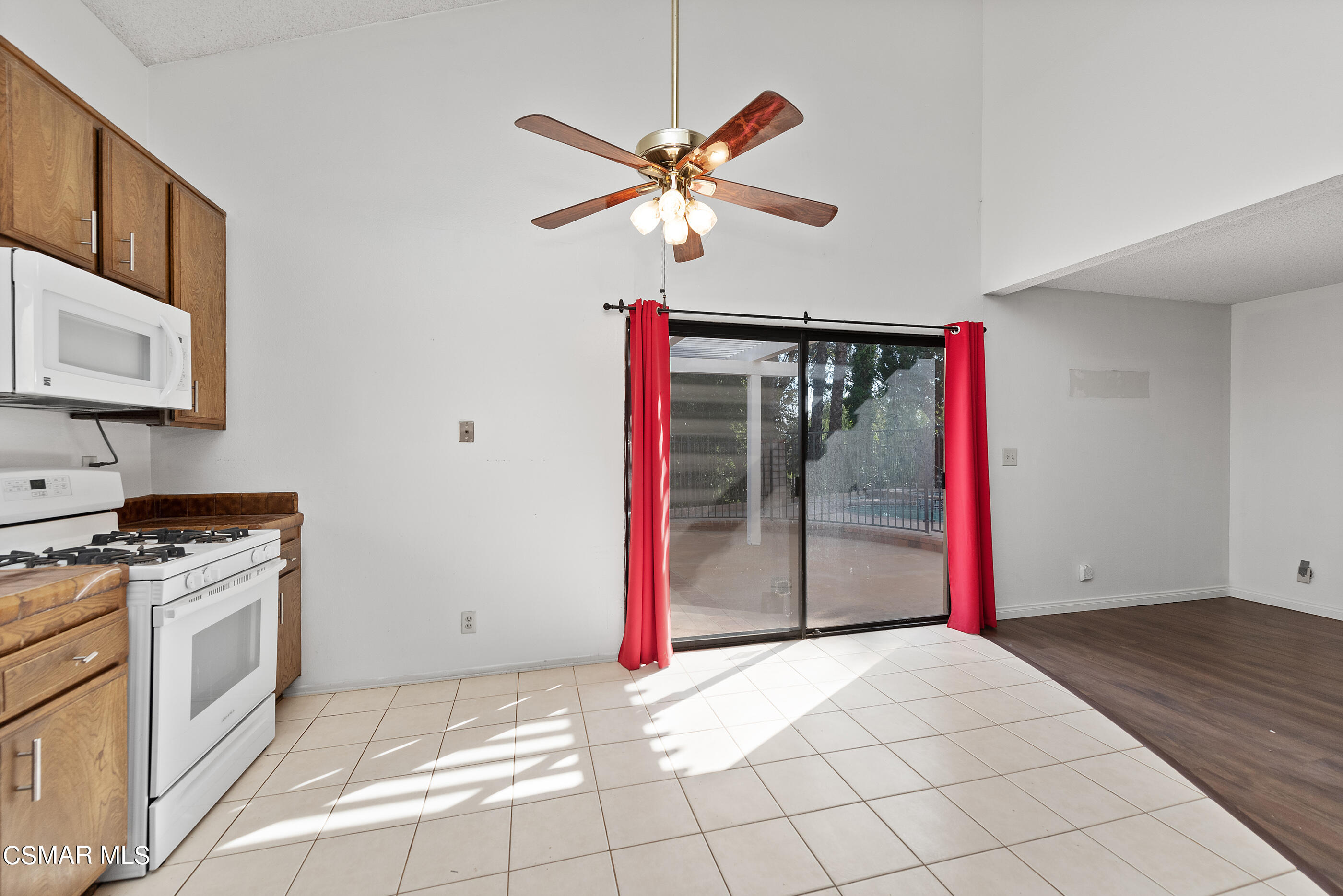 837 Hillview Circle Simi Valley, CA 93065 - Photo 14 of 42 a view of a kitchen with a stove and a cabinets