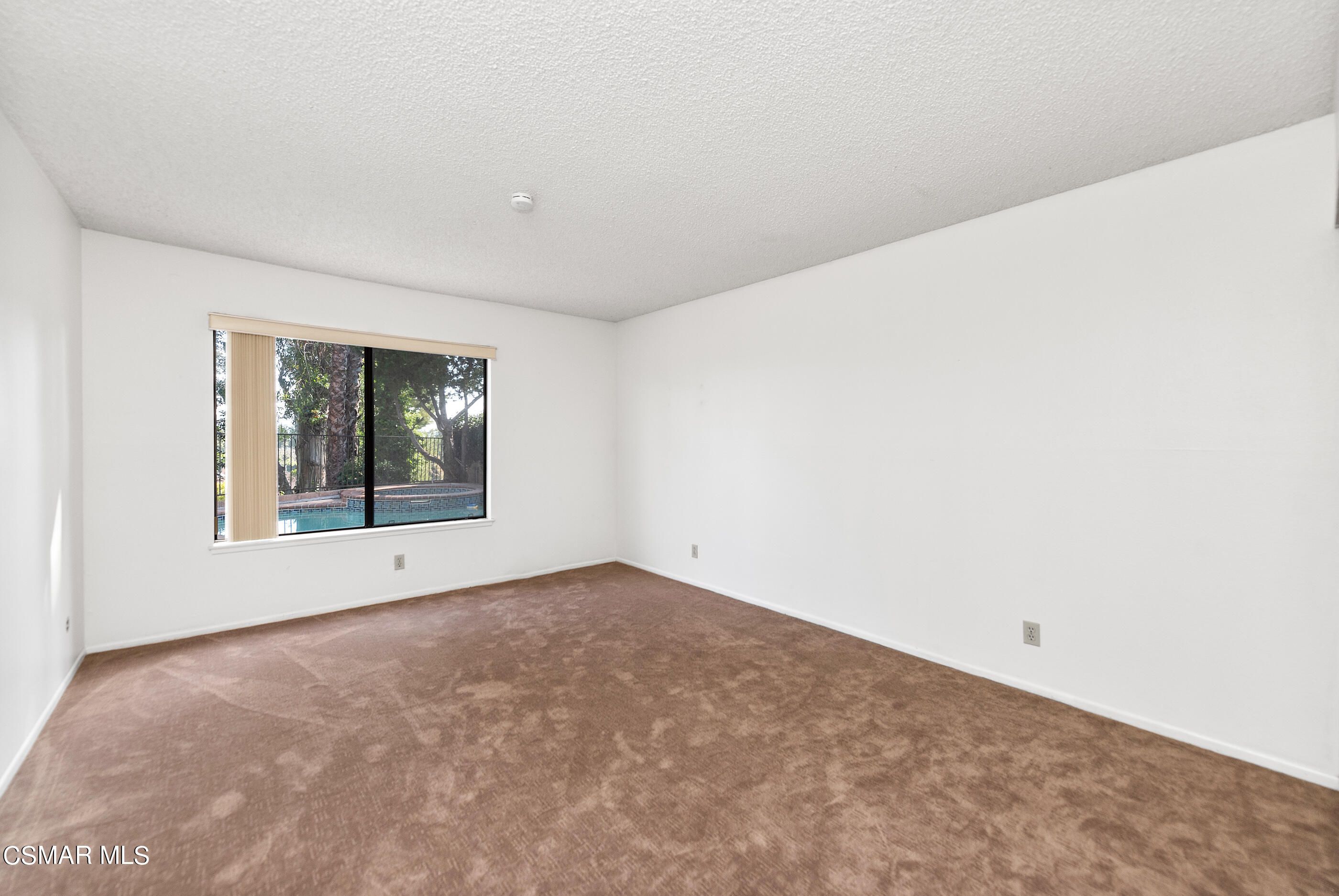 837 Hillview Circle Simi Valley, CA 93065 - Photo 16 of 42 a view of an empty room with a window