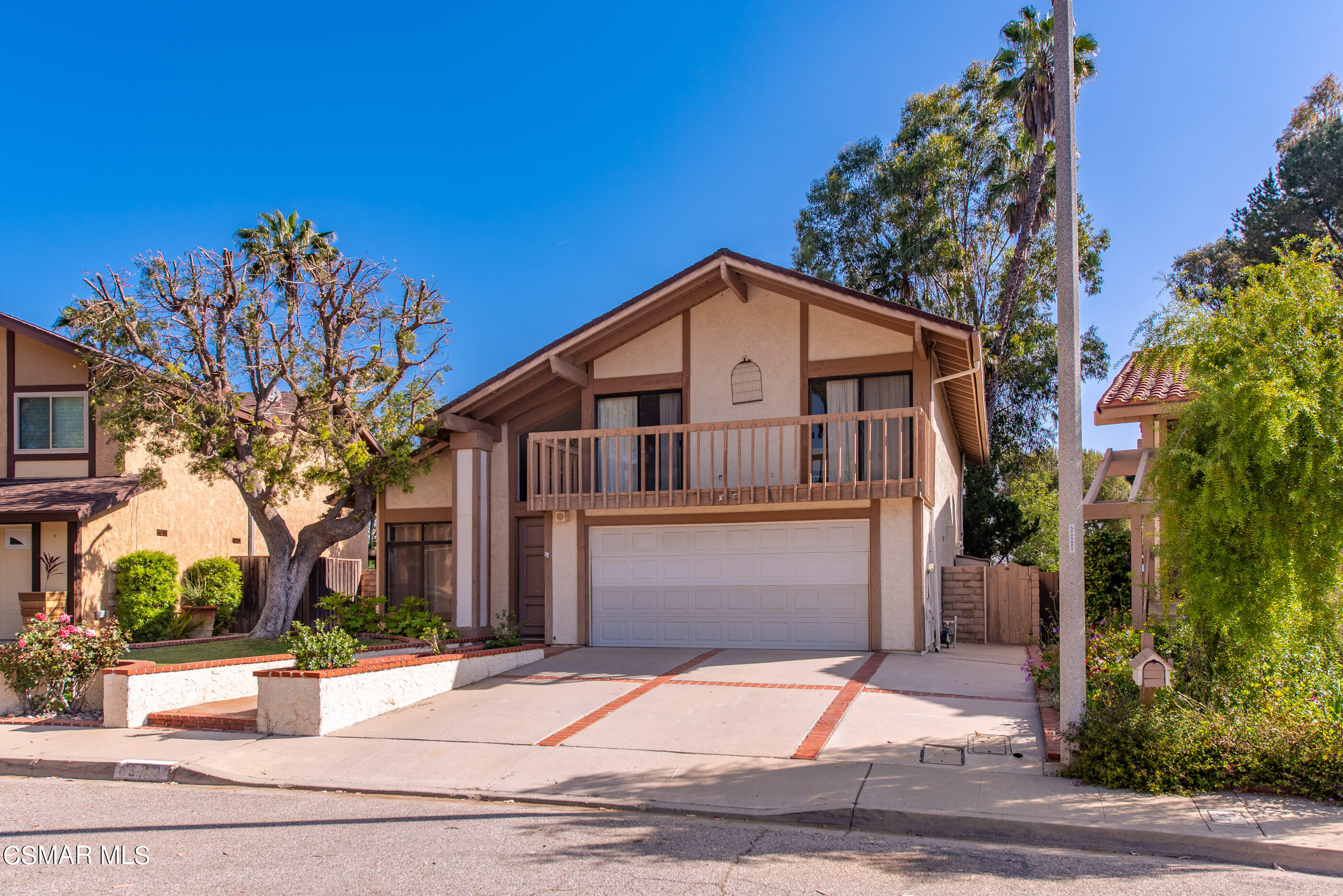837 Hillview Circle Simi Valley, CA 93065 - Photo 3 of 42 a front view of a house with a yard