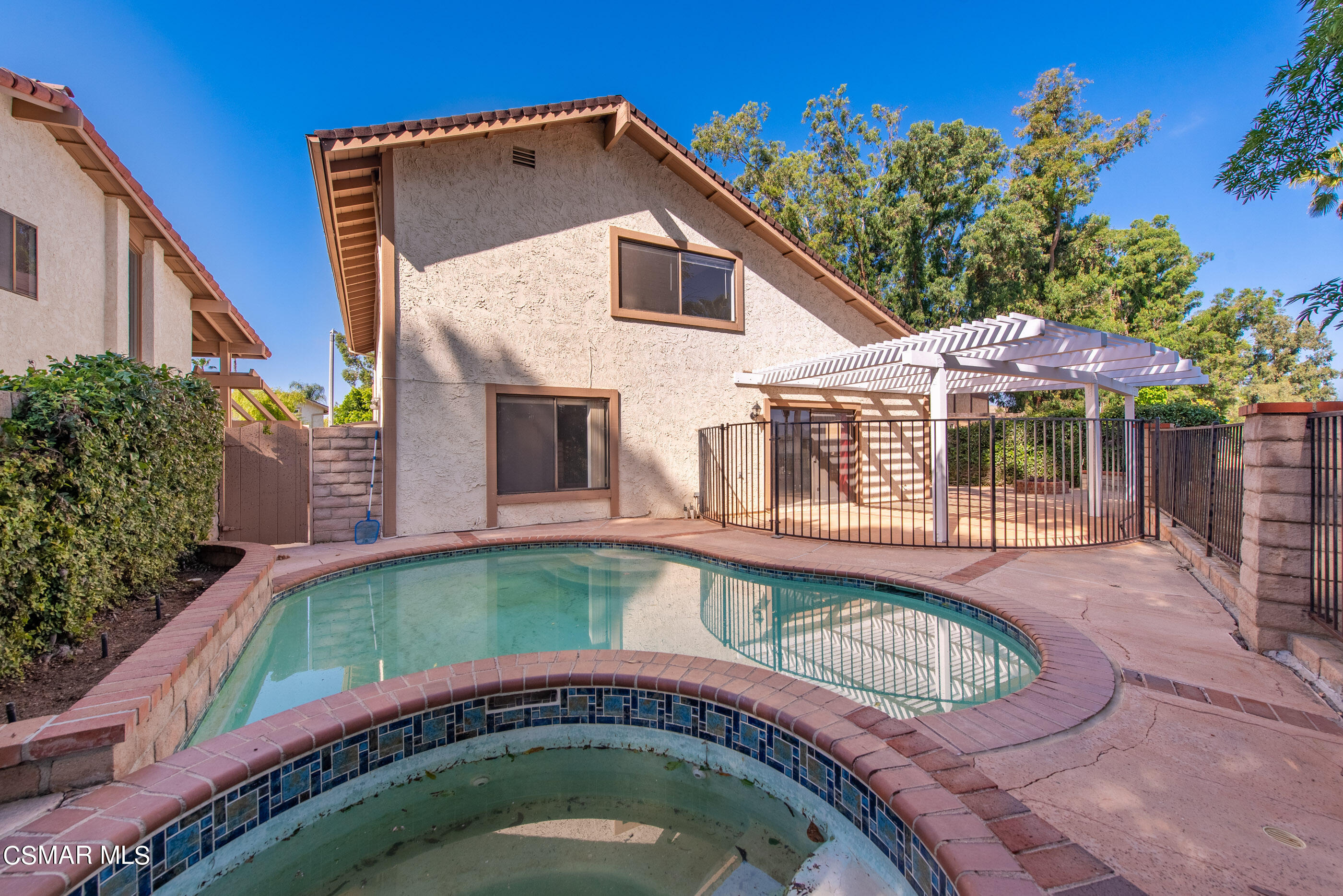837 Hillview Circle Simi Valley, CA 93065 - Photo 37 of 42 a front view of a house with swimming pool