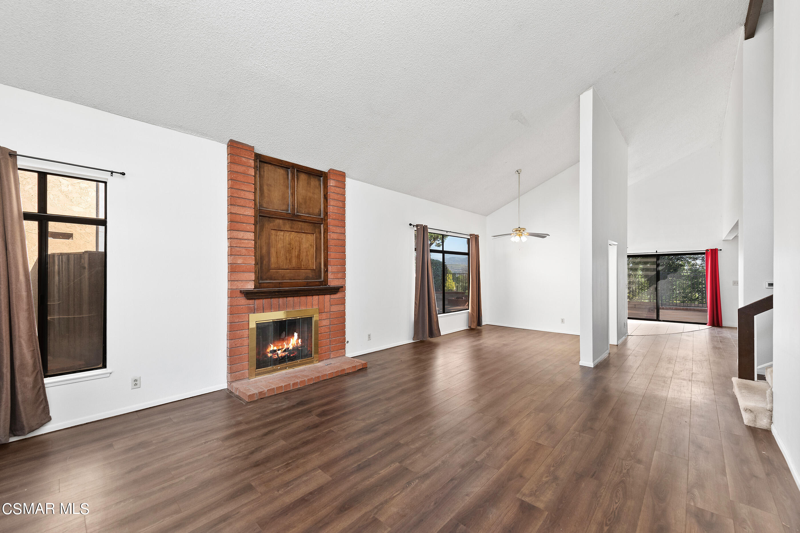 837 Hillview Circle Simi Valley, CA 93065 - Photo 4 of 42 a view of a livingroom with wooden floor and a fireplace