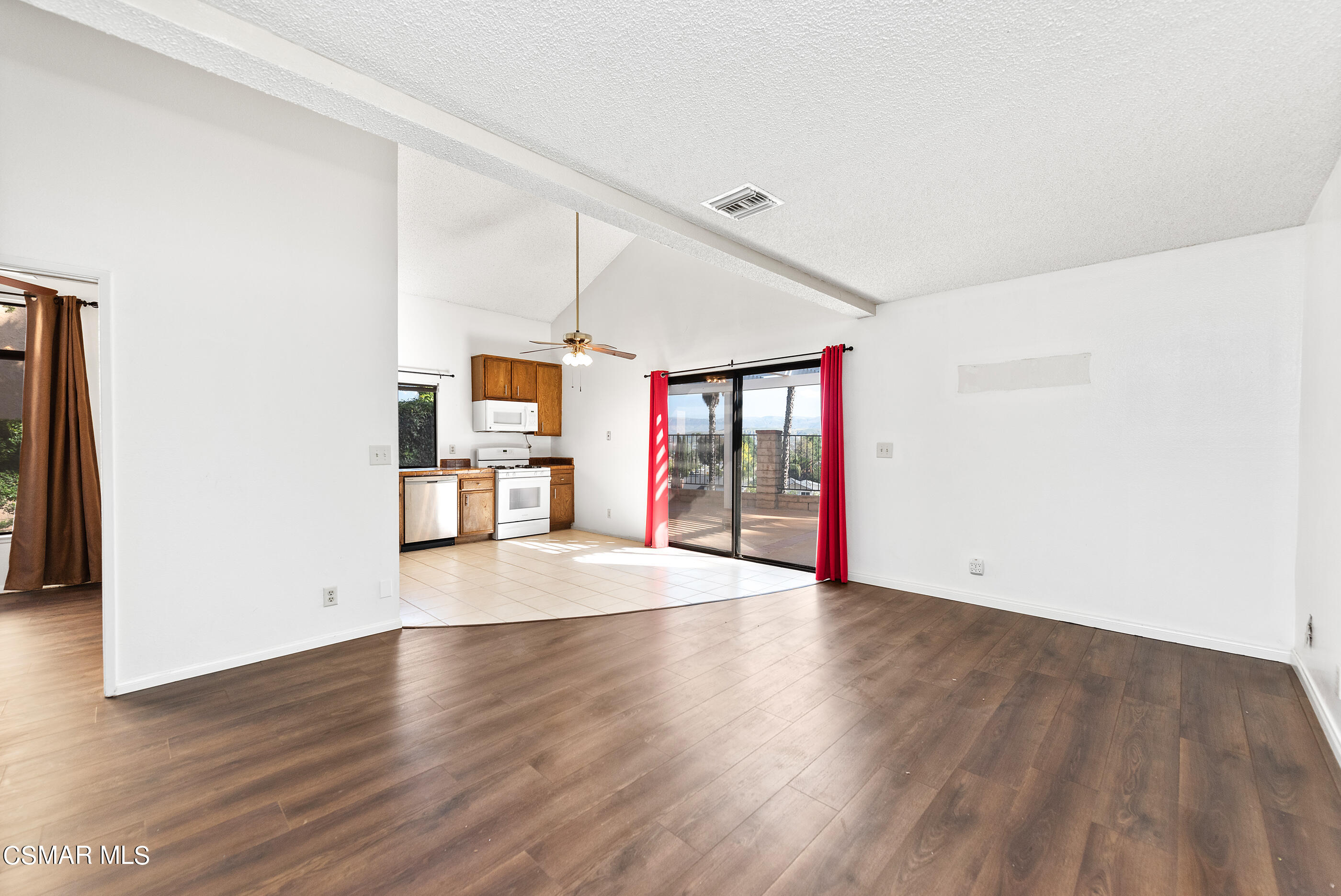 837 Hillview Circle Simi Valley, CA 93065 - Photo 9 of 42 a view of an empty room with wooden floor and a window