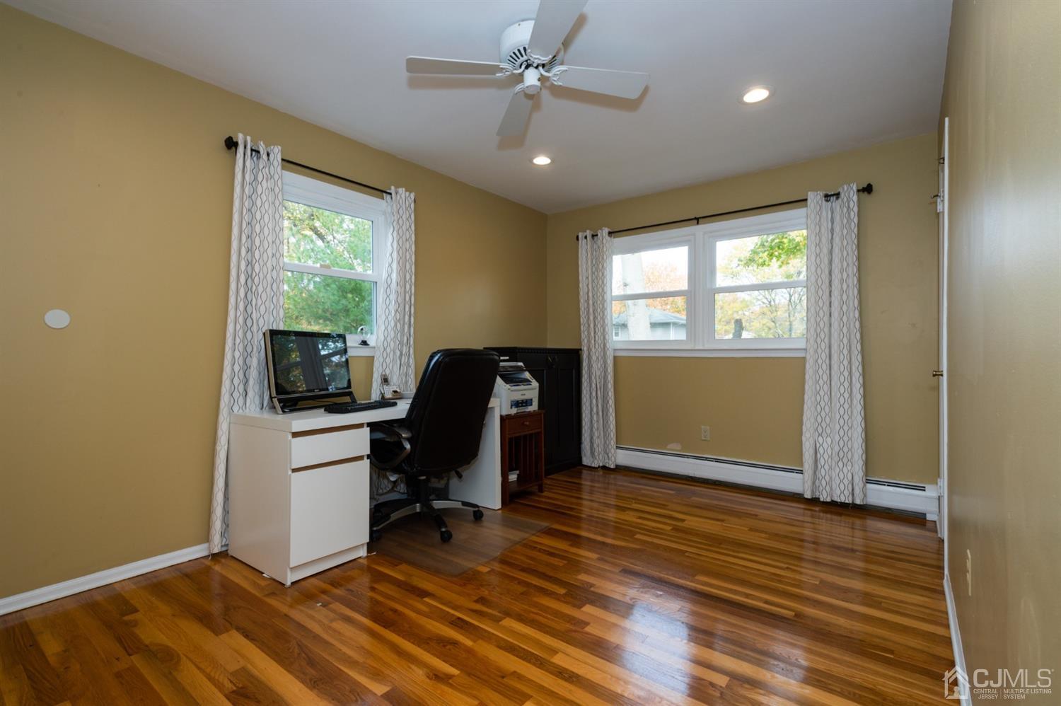 37 Lynnwood Road Edison, NJ 08820 - Photo 16 of 20 a view of workspace with wooden floor and windows