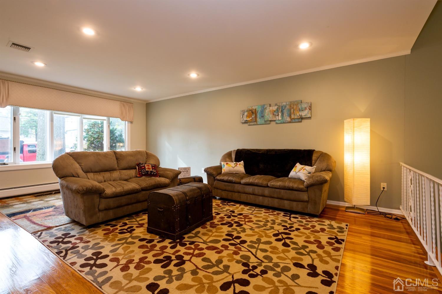 37 Lynnwood Road Edison, NJ 08820 - Photo 3 of 20 a living room with furniture and a rug