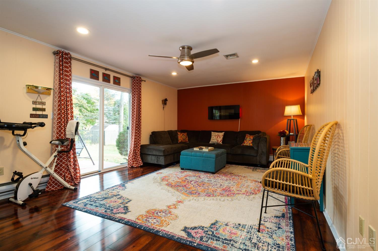 37 Lynnwood Road Edison, NJ 08820 - Photo 10 of 20 a living room with furniture and a flat screen tv