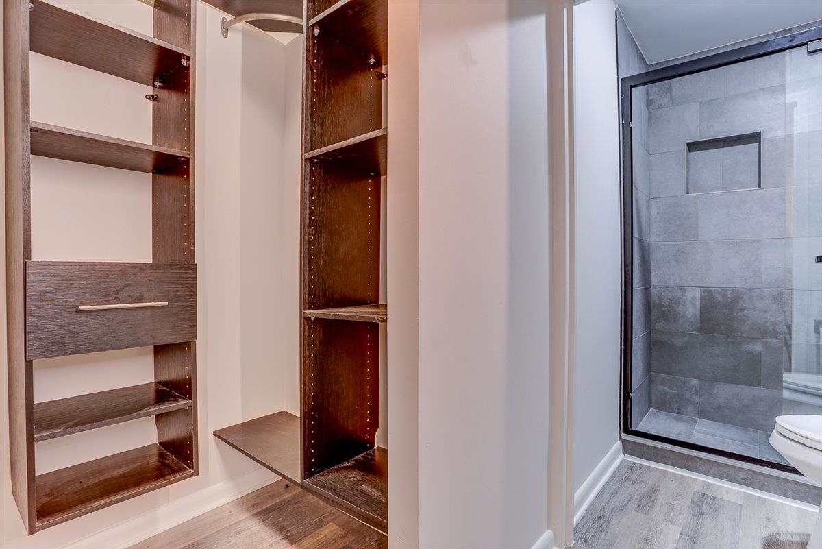 232 South Highland Street, Unit 409 Memphis, TN 38111 - Photo 22 of 39 a view of walk in closet with empty racks
