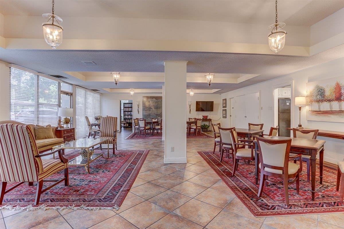 232 South Highland Street, Unit 409 Memphis, TN 38111 - Photo 32 of 39 a view of a dining room with furniture