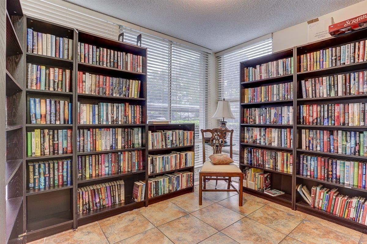 232 South Highland Street, Unit 409 Memphis, TN 38111 - Photo 35 of 39 a view of a book shelf with lots of books