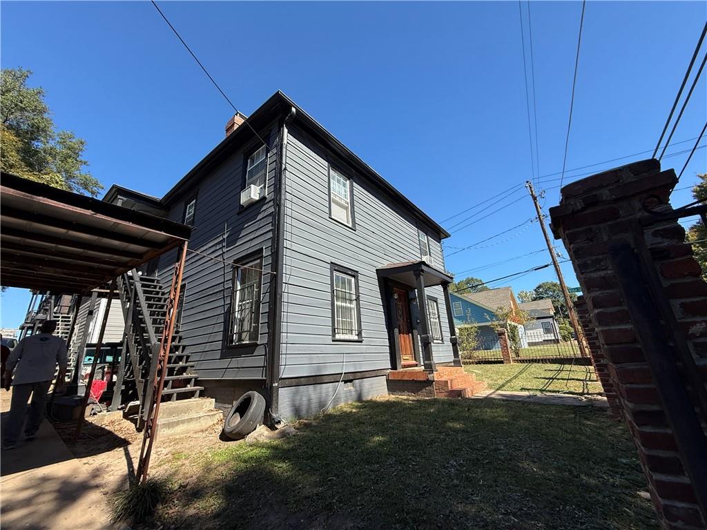 117 Vine Street Southwest, Unit B Atlanta, GA 30314 - Photo 16 of 22 a view of a house with backyard and porch