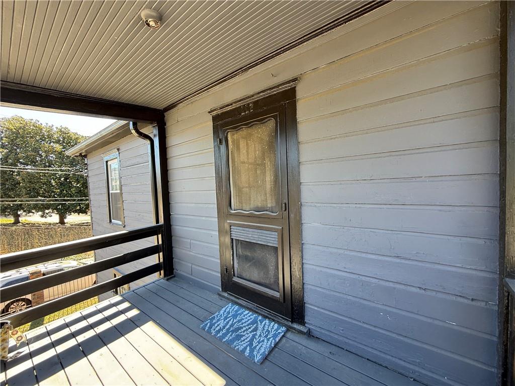 117 Vine Street Southwest, Unit B Atlanta, GA 30314 - Photo 9 of 22 a view of a balcony with wooden floor