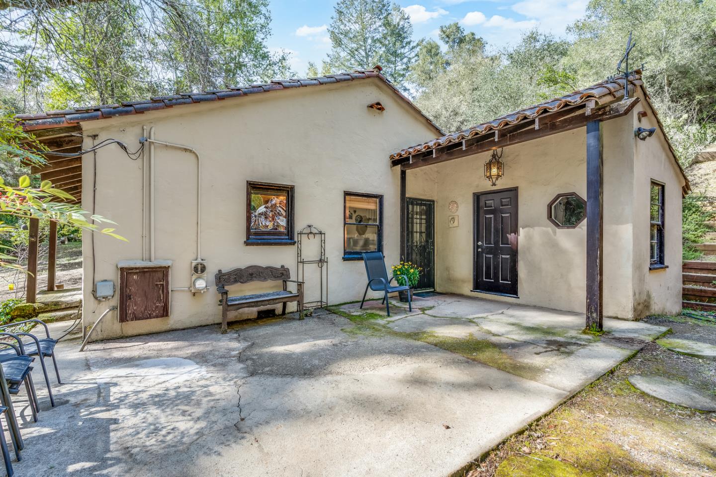 22200 Aldercroft Heights Road Los Gatos, CA 95033 - Photo 15 of 45 a backyard of a house with yard and outdoor seating