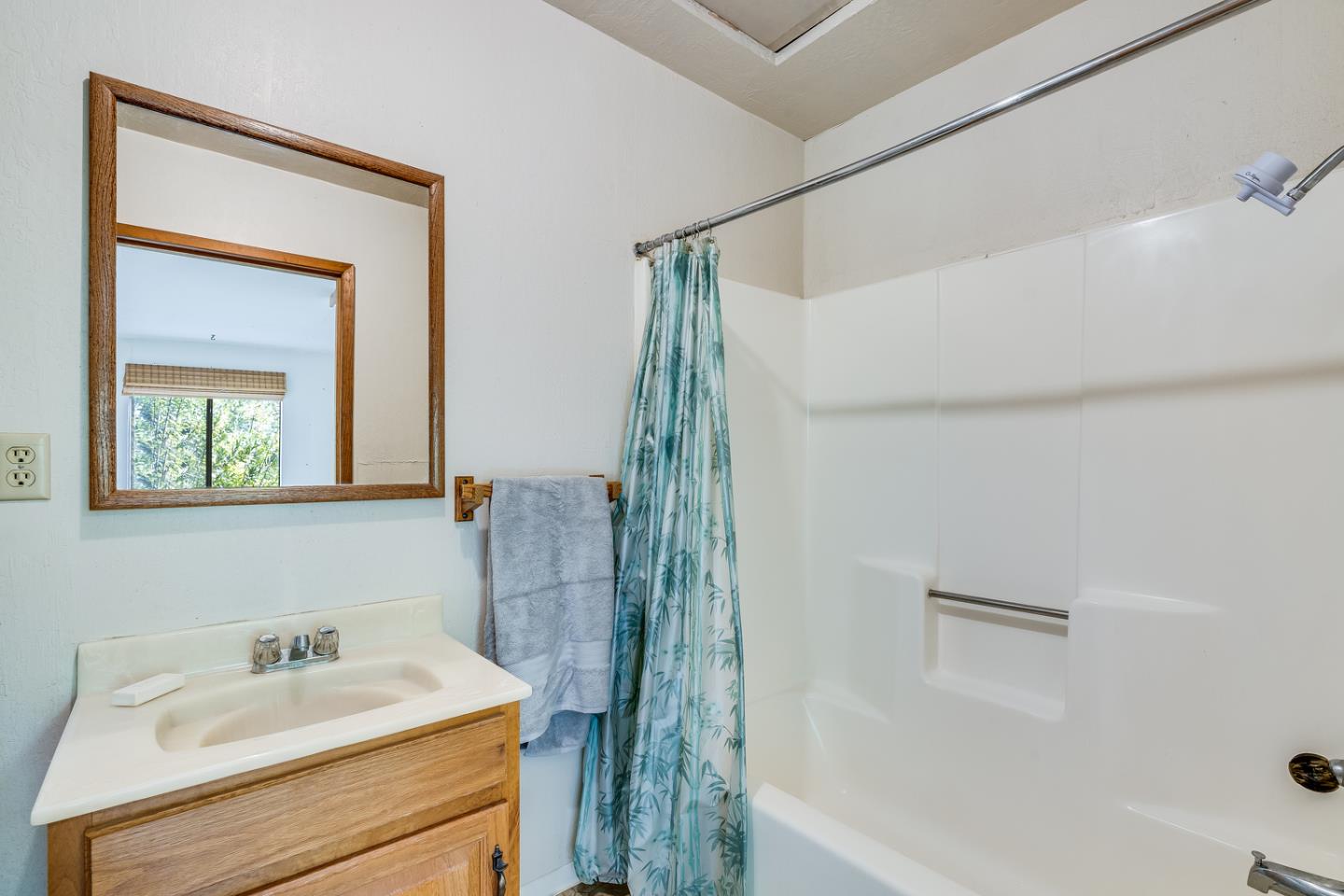 22200 Aldercroft Heights Road Los Gatos, CA 95033 - Photo 23 of 45 a bathroom with a sink and a mirror