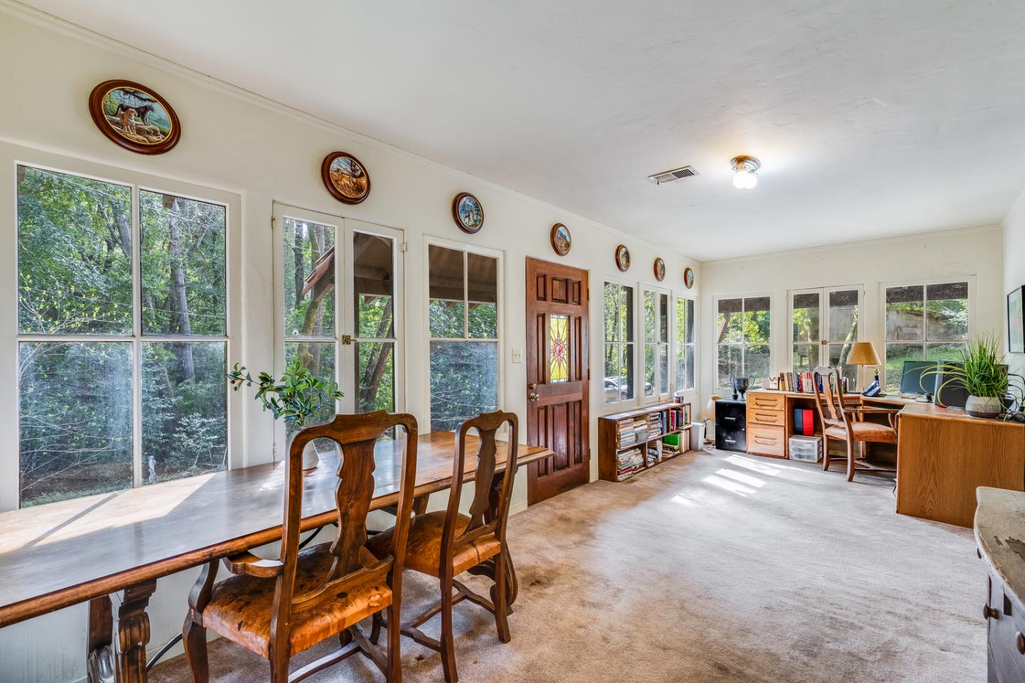 22200 Aldercroft Heights Road Los Gatos, CA 95033 - Photo 5 of 45 a view of a livingroom with furniture and a large window