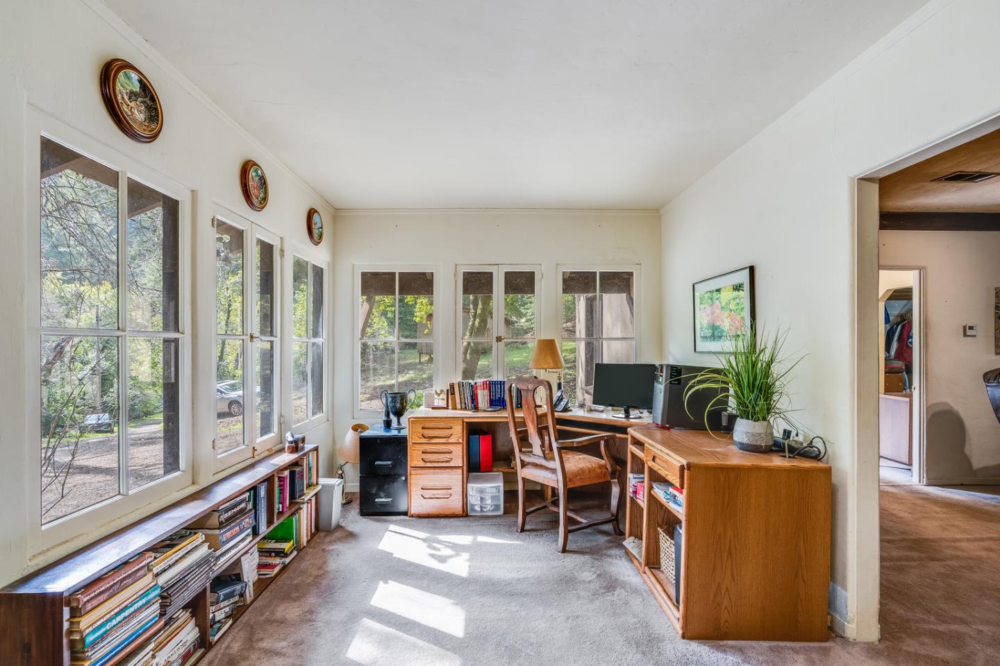 22200 Aldercroft Heights Road Los Gatos, CA 95033 - Photo 6 of 45 a living room with furniture and a floor to ceiling window