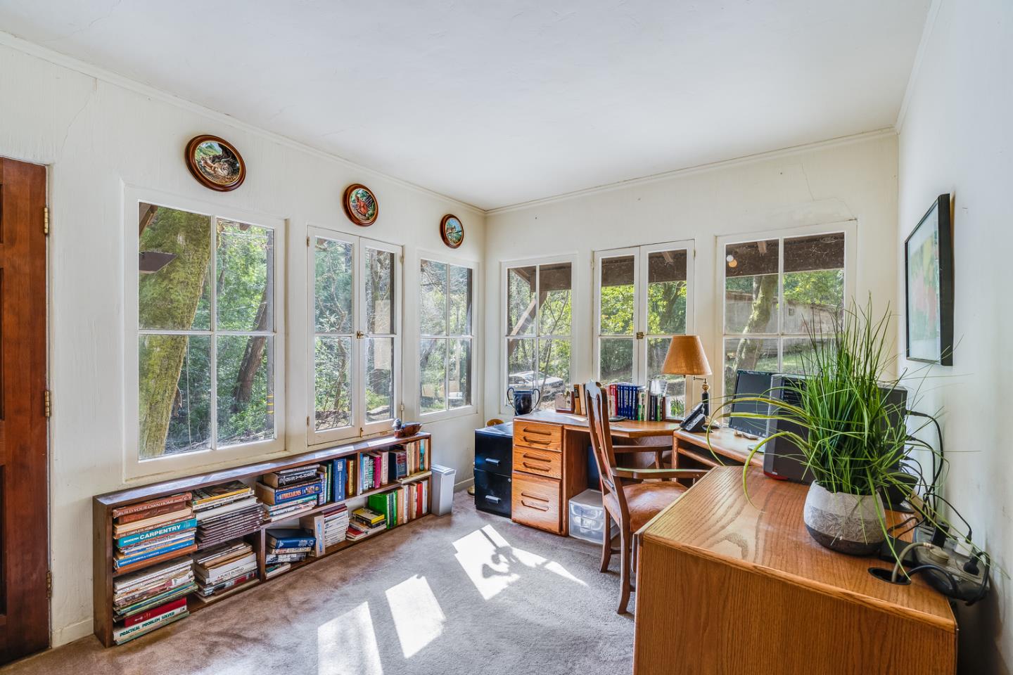 22200 Aldercroft Heights Road Los Gatos, CA 95033 - Photo 7 of 45 a view of a livingroom with furniture and a large window