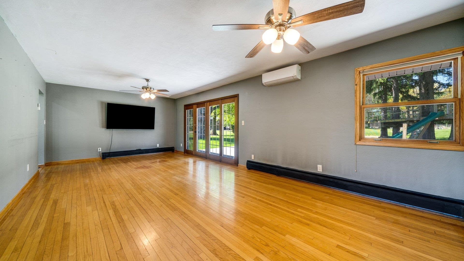 313 West Margaret Fuller Road Oregon, IL 61061 - Photo 9 of 46 a view of empty room with a flat screen tv