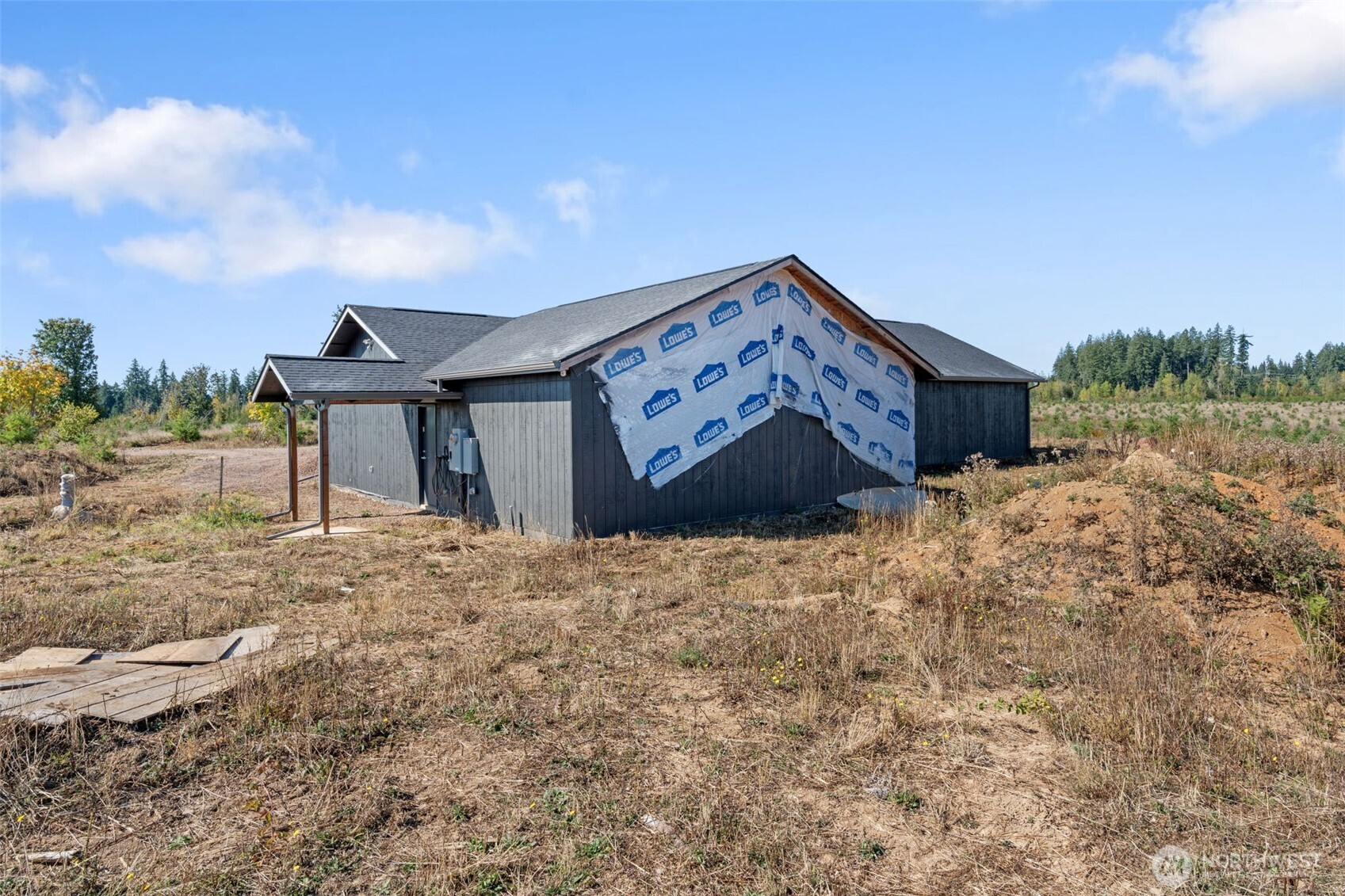 158 Macomber Road West Chehalis, WA 98532 - Photo 4 of 19 a front view of a house with a yard