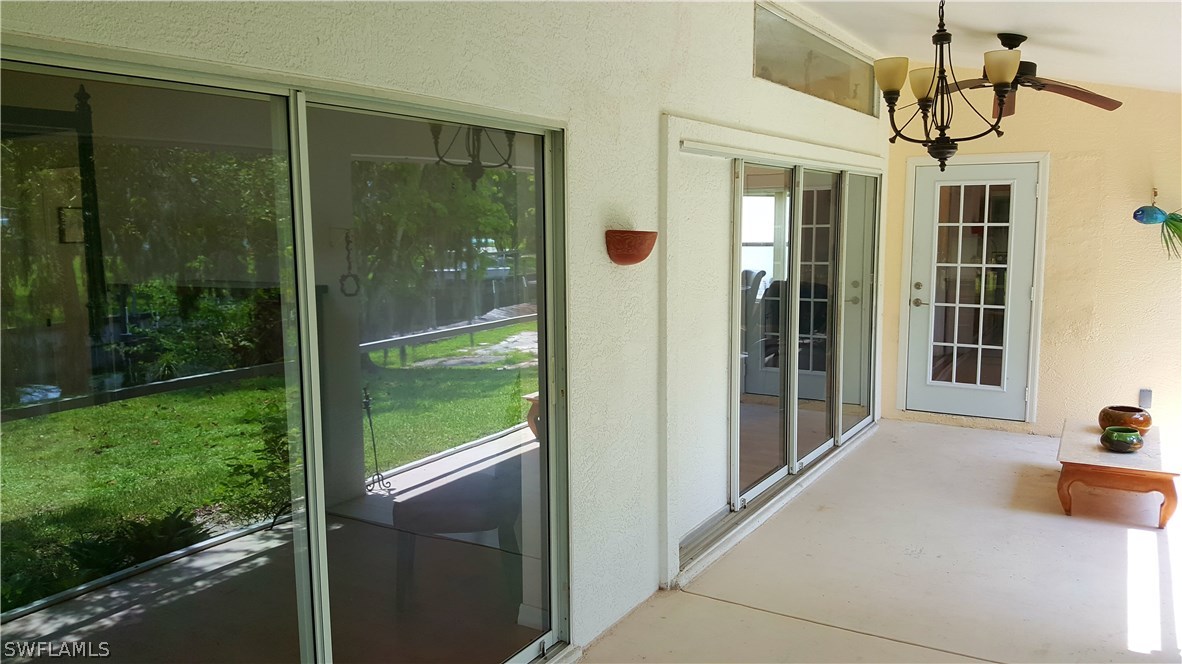 2160 Gardner Road Alva, FL 33920 - Photo 15 of 21 a view of a glass door and porch