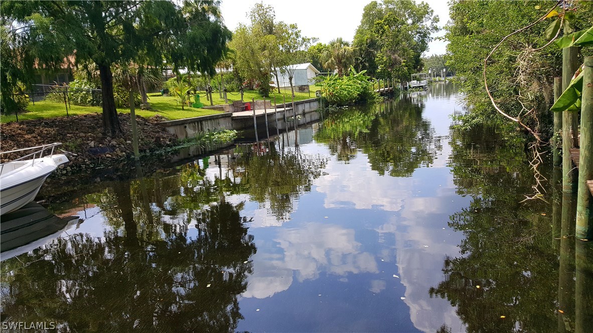 2160 Gardner Road Alva, FL 33920 - Photo 18 of 21 a view of a lake with a lake