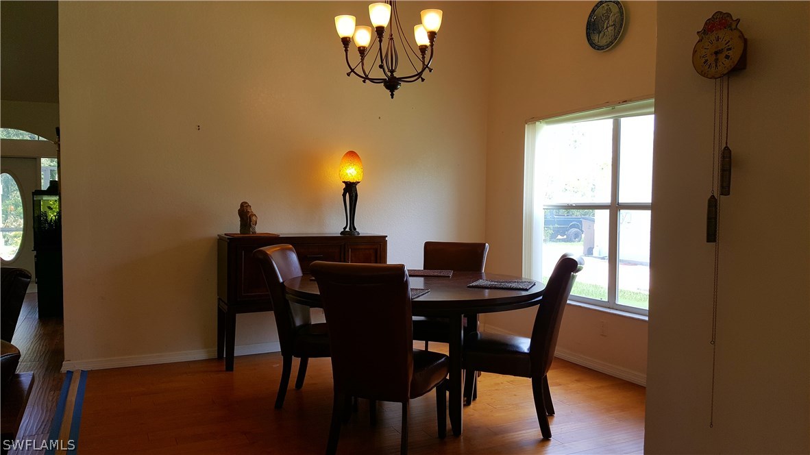 2160 Gardner Road Alva, FL 33920 - Photo 5 of 21 a view of a dining room with furniture and window