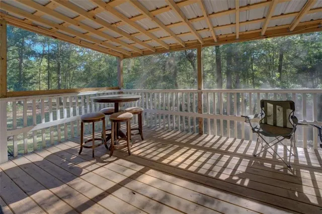 a view of a chairs on the roof deck