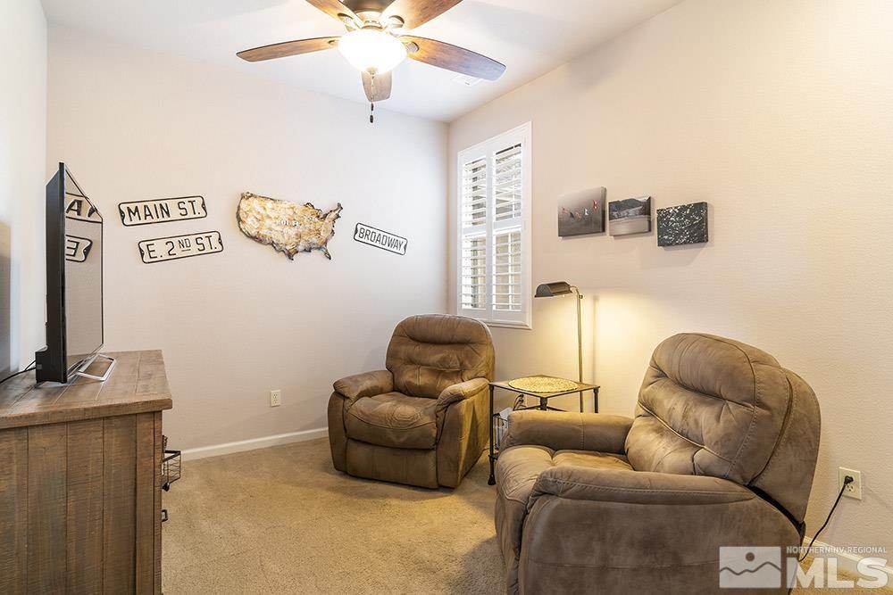 1898 Stetson Drive Reno, NV 89521 - Photo 12 of 19 a living room with furniture and a flat screen tv