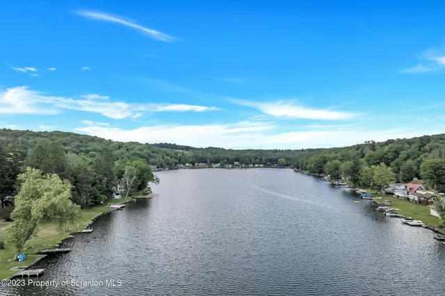 a view of a lake with mountain in the background