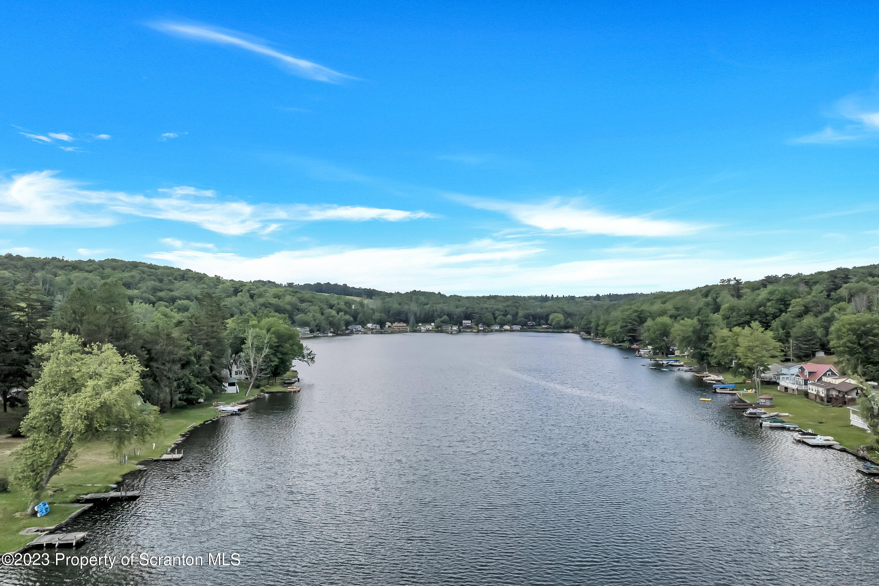a view of a lake with mountain in the background