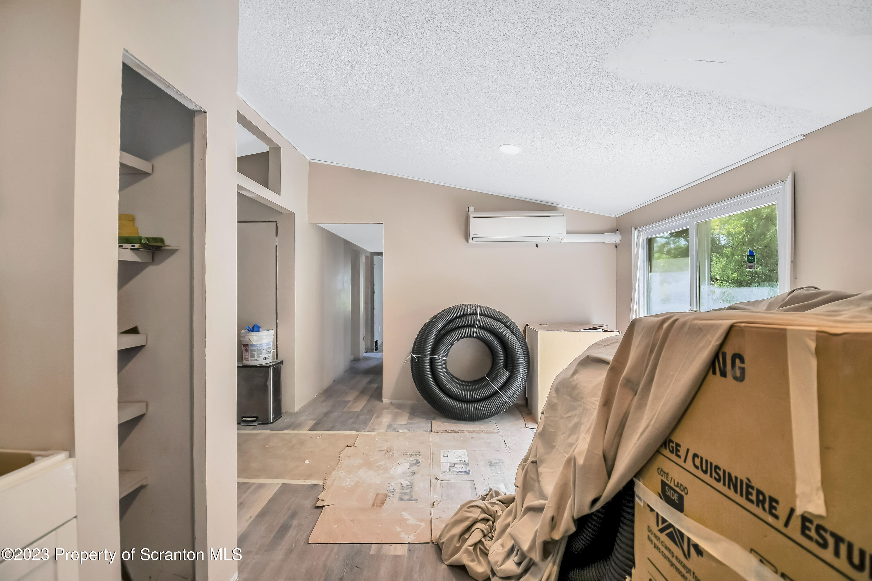 11715 Forest Lake Road Montrose, PA 18801 - Photo 13 of 40 a view of a livingroom with furniture and windows