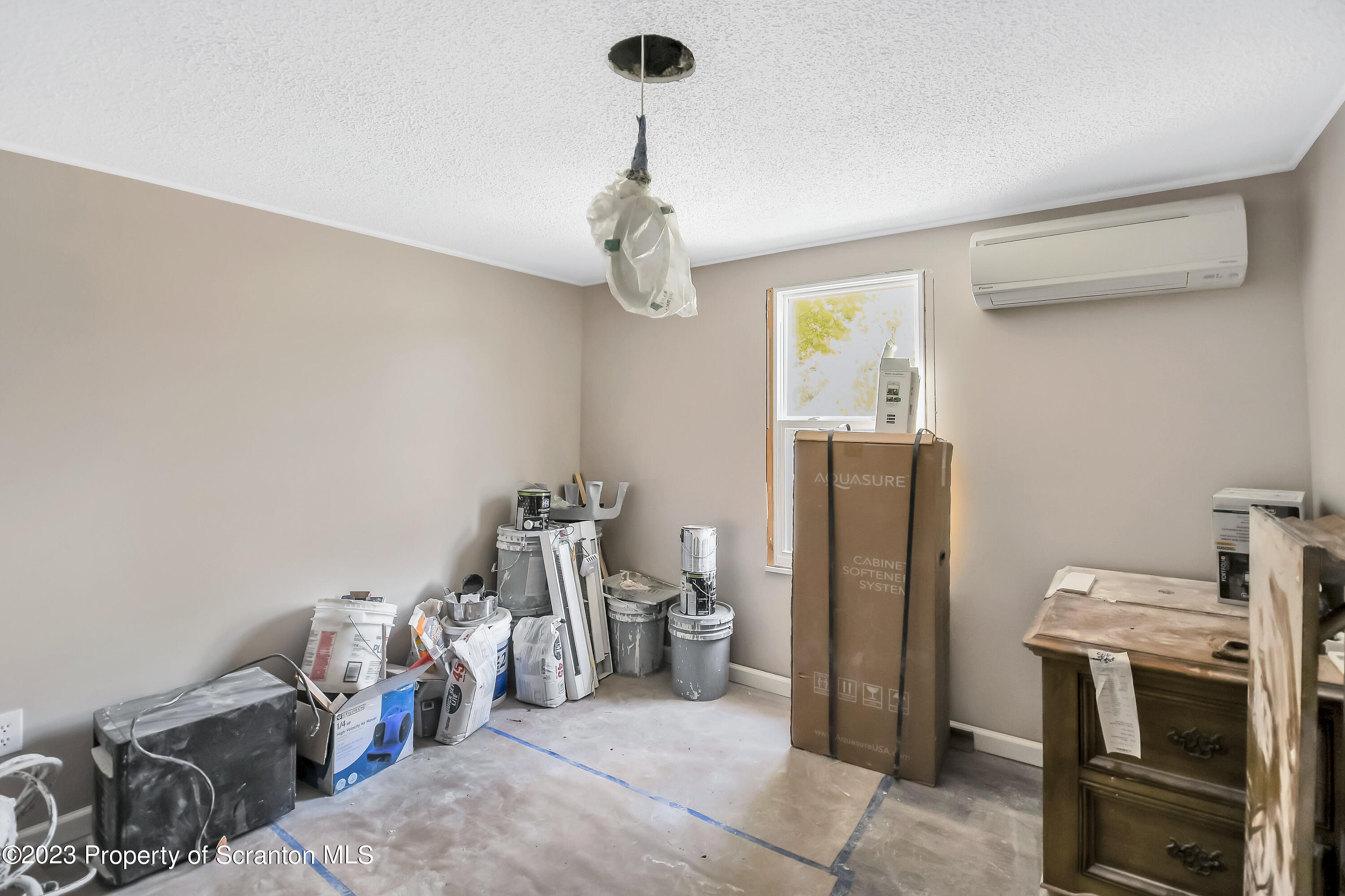 11715 Forest Lake Road Montrose, PA 18801 - Photo 17 of 40 a view of a livingroom with a chandelier