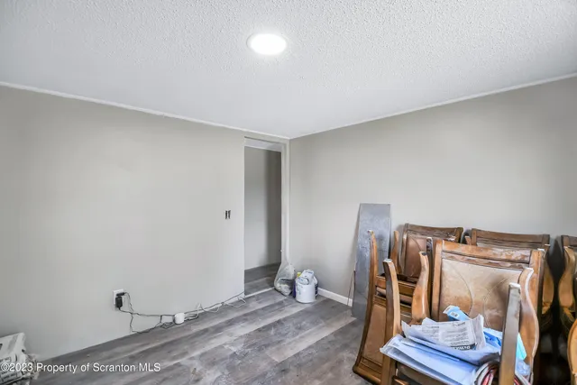 a view of room with stairs and ventilation