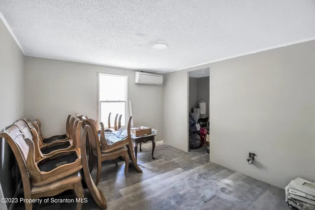 a view of a workspace with furniture