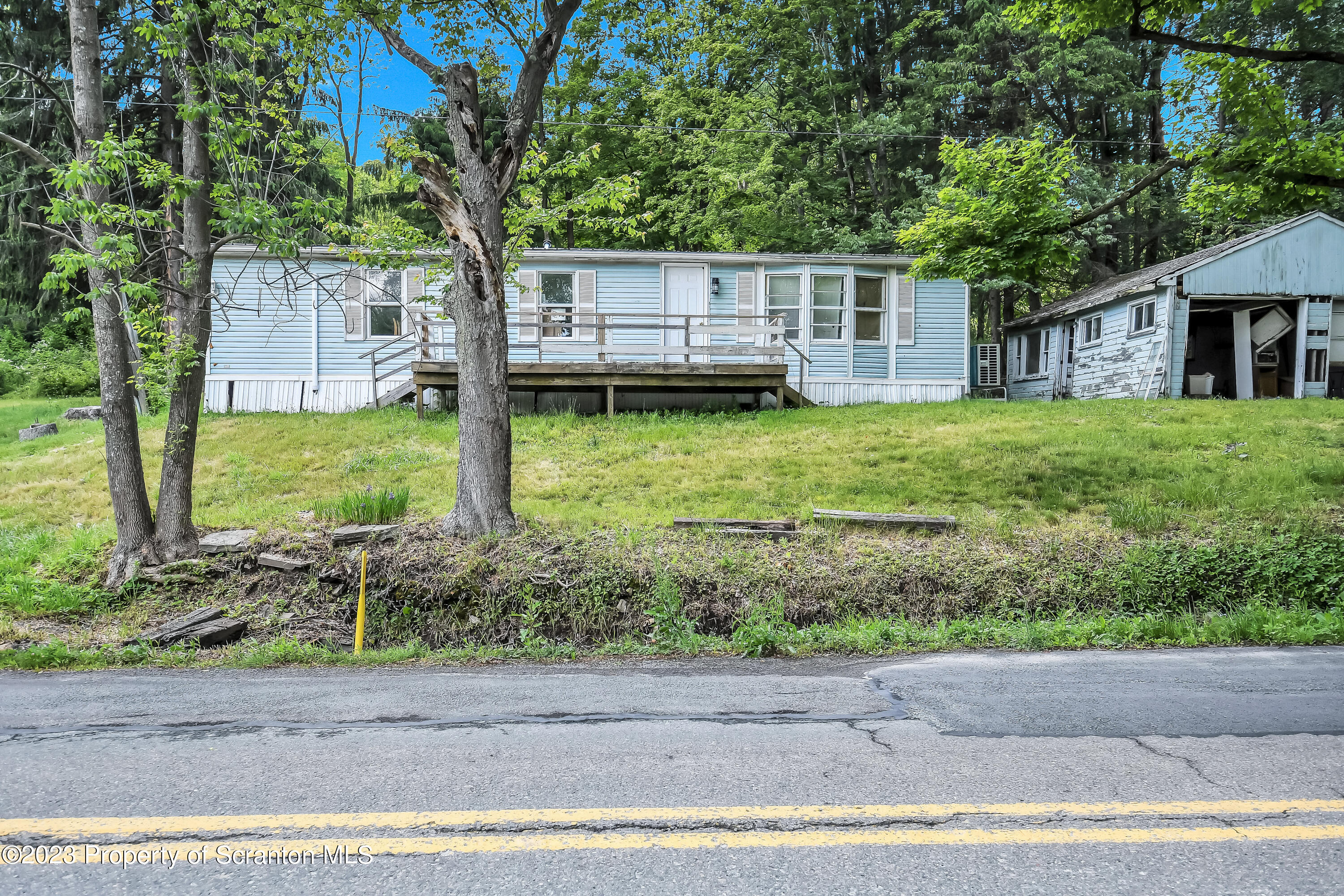 11715 Forest Lake Road Montrose, PA 18801 - Photo 38 of 40 a view of a house with a backyard