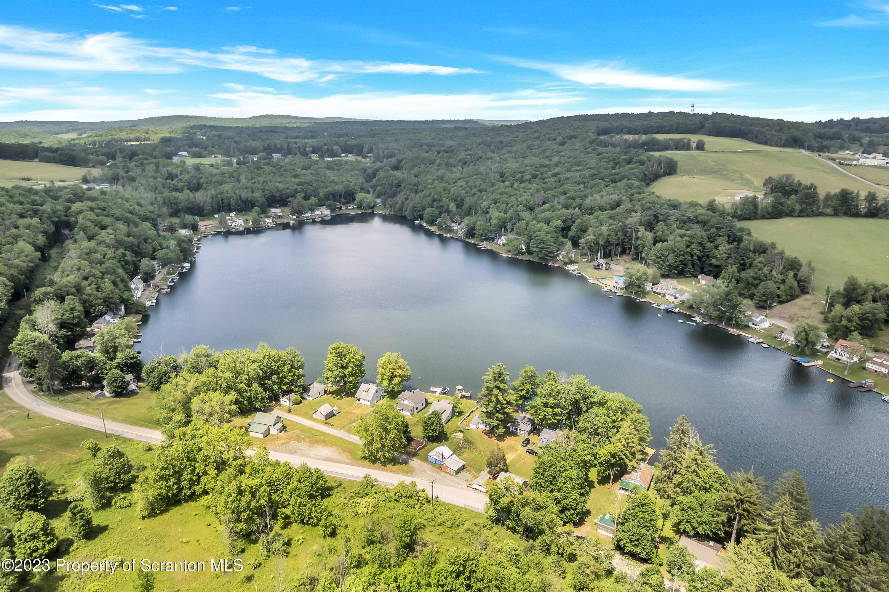 11715 Forest Lake Road Montrose, PA 18801 - Photo 4 of 40 an aerial view of a houses with ocean view