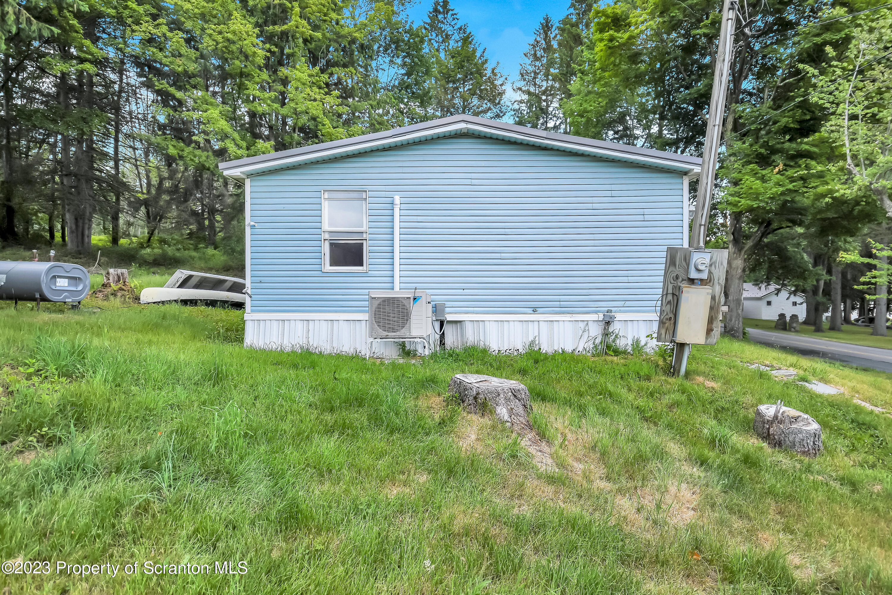 11715 Forest Lake Road Montrose, PA 18801 - Photo 5 of 40 a backyard of a house with seating space