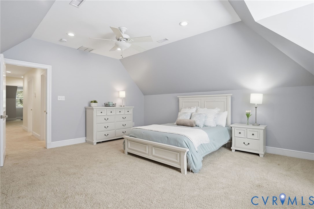 12123 Deer Ridge Court Ashland, VA 23005 - Photo 51 of 63 a spacious bedroom with a bed and a cabinets