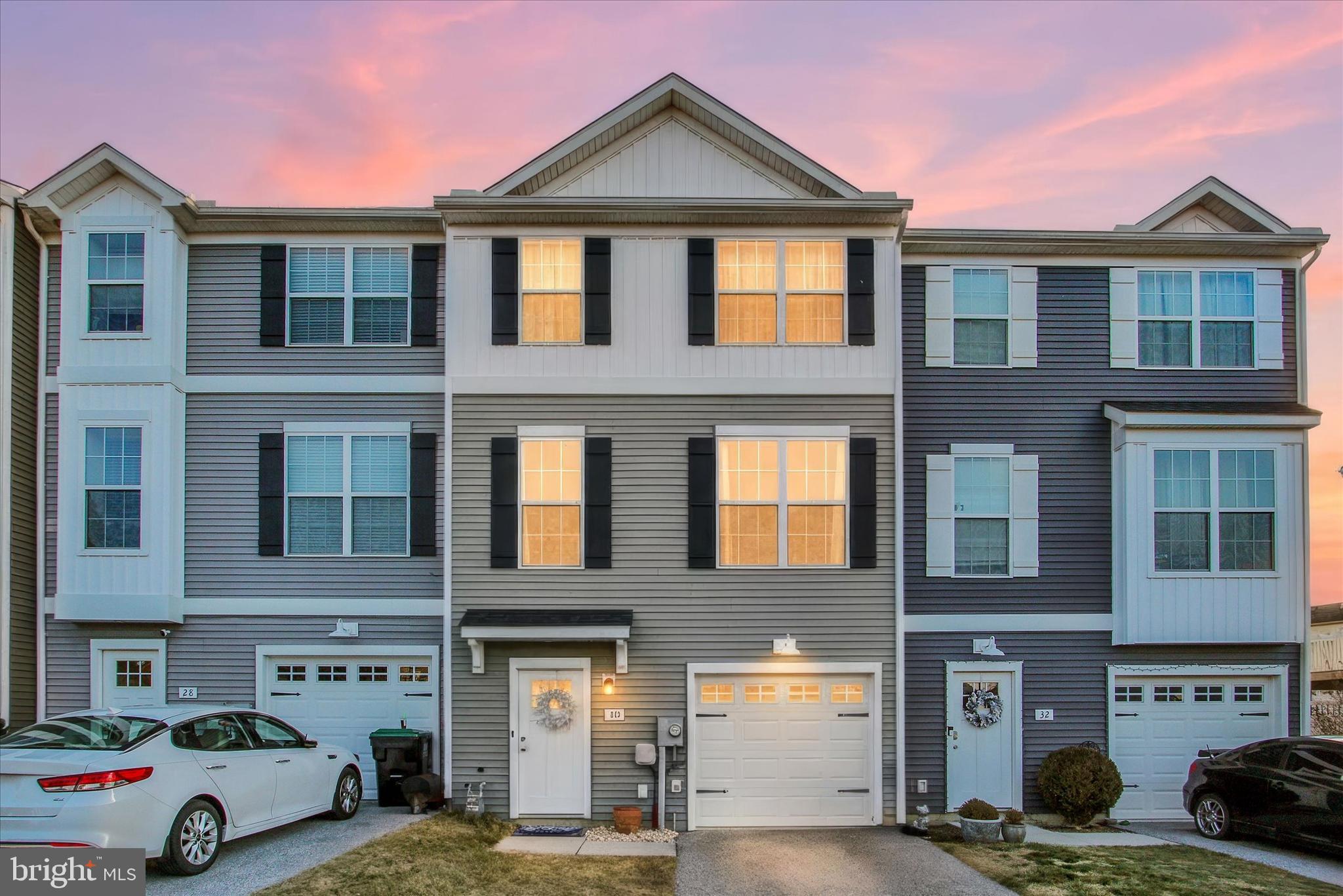 30 Brookside Avenue Hanover, PA 17331 - Photo 1 of 23 a front view of a residential apartment building with a yard