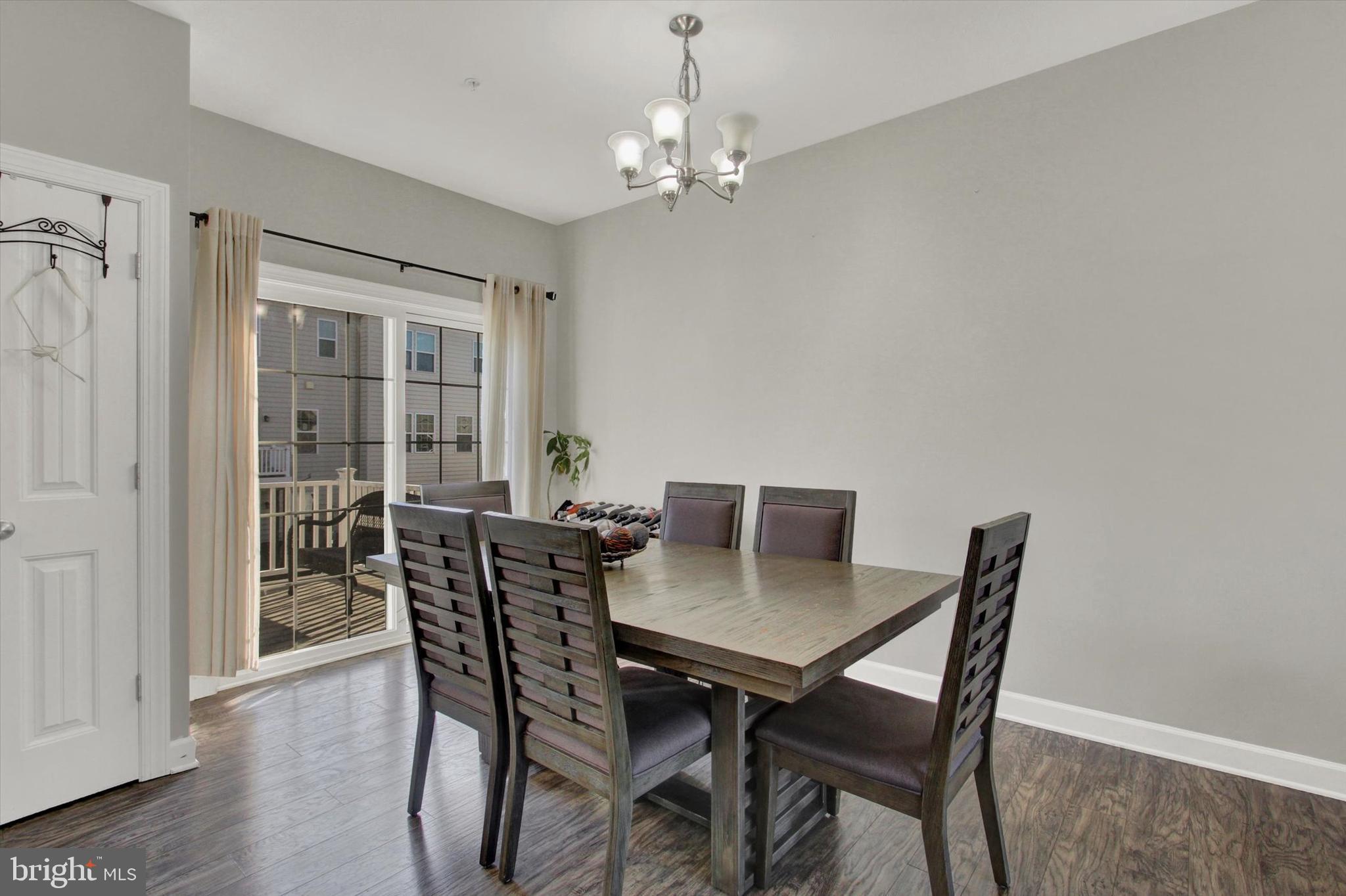 30 Brookside Avenue Hanover, PA 17331 - Photo 13 of 23 a view of a dining room with furniture and wooden floor