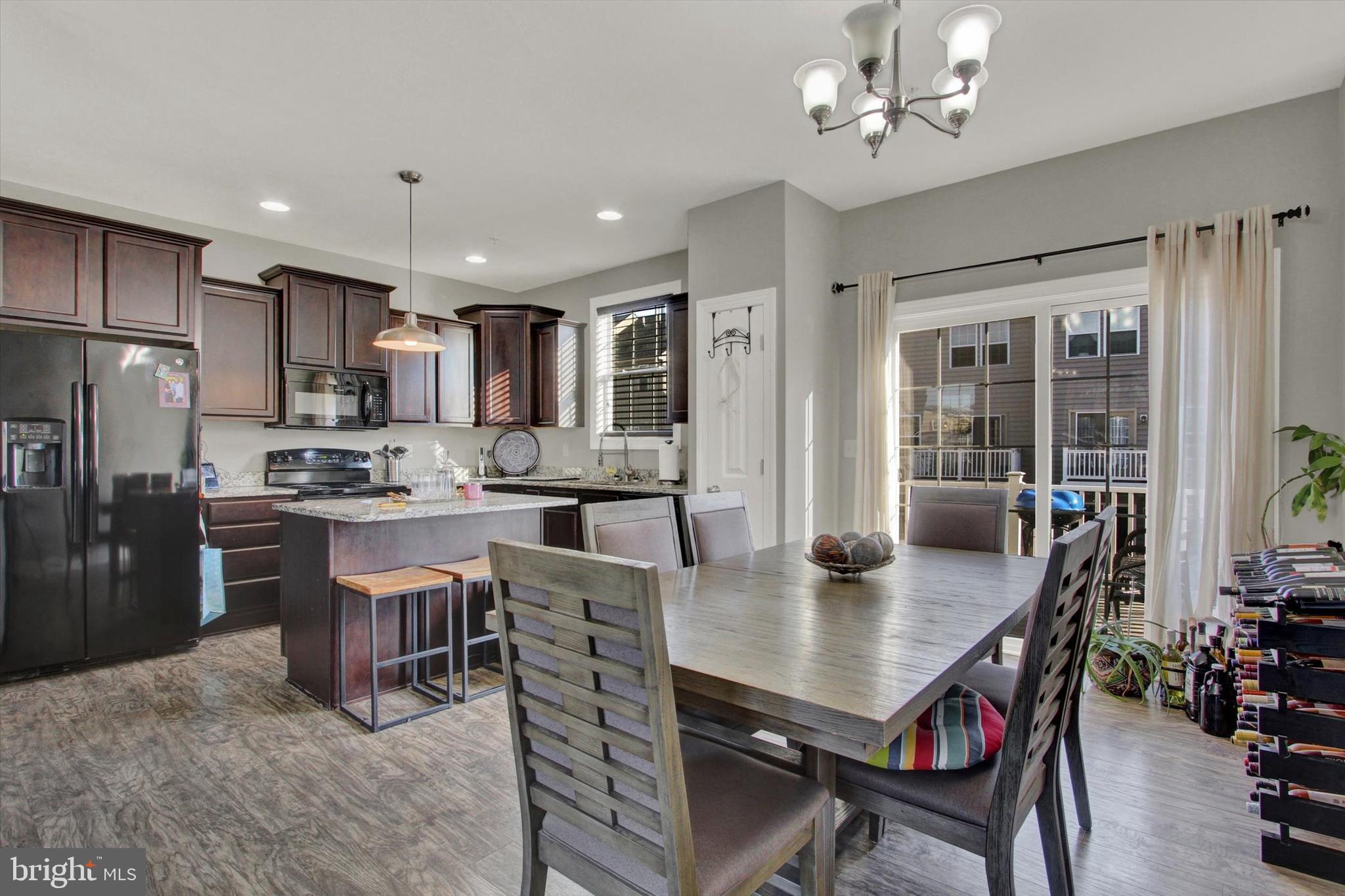 30 Brookside Avenue Hanover, PA 17331 - Photo 14 of 23 a view of kitchen with refrigerator dining table and chairs
