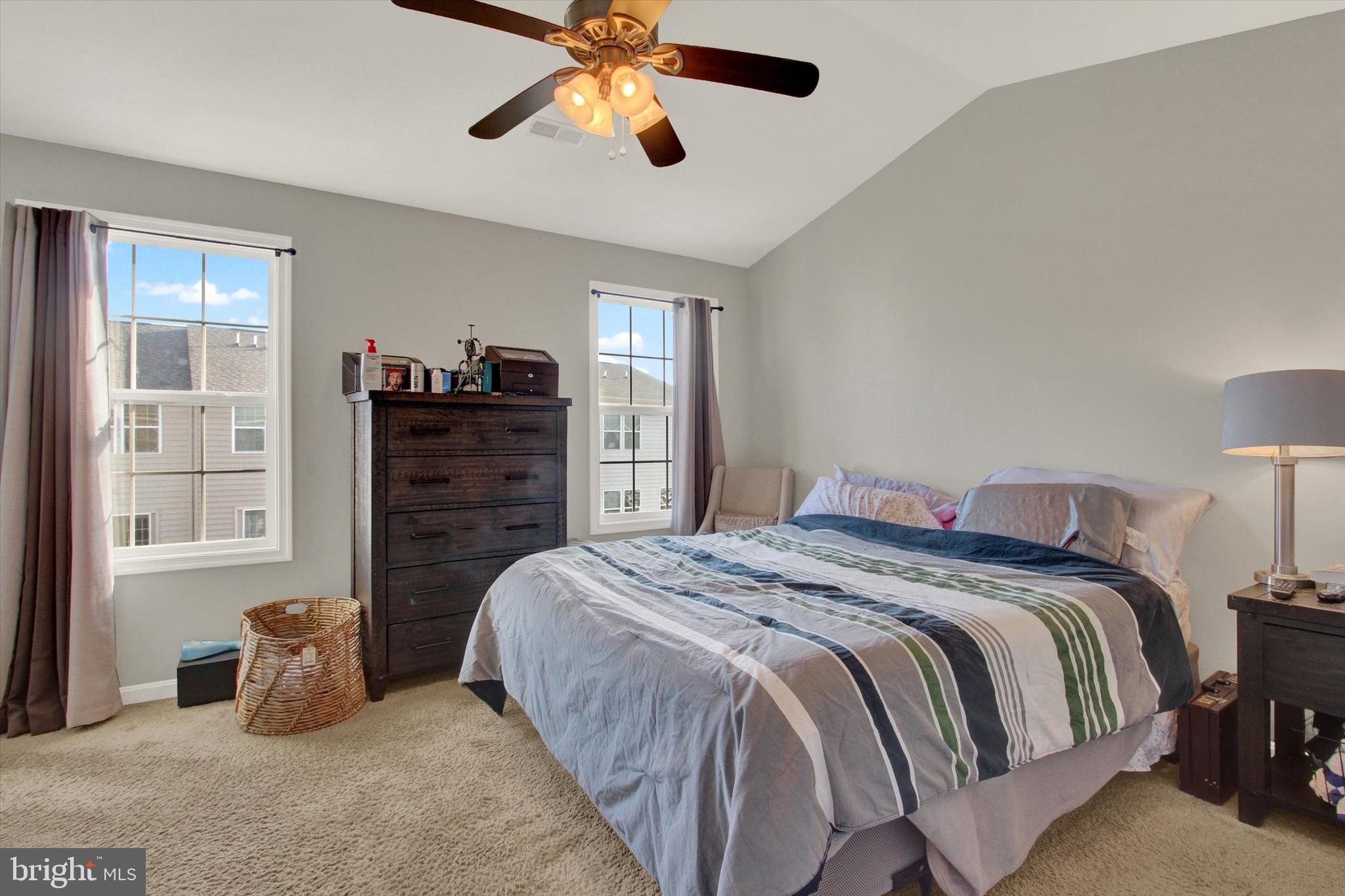 30 Brookside Avenue Hanover, PA 17331 - Photo 17 of 23 a bedroom with a bed and a chandelier