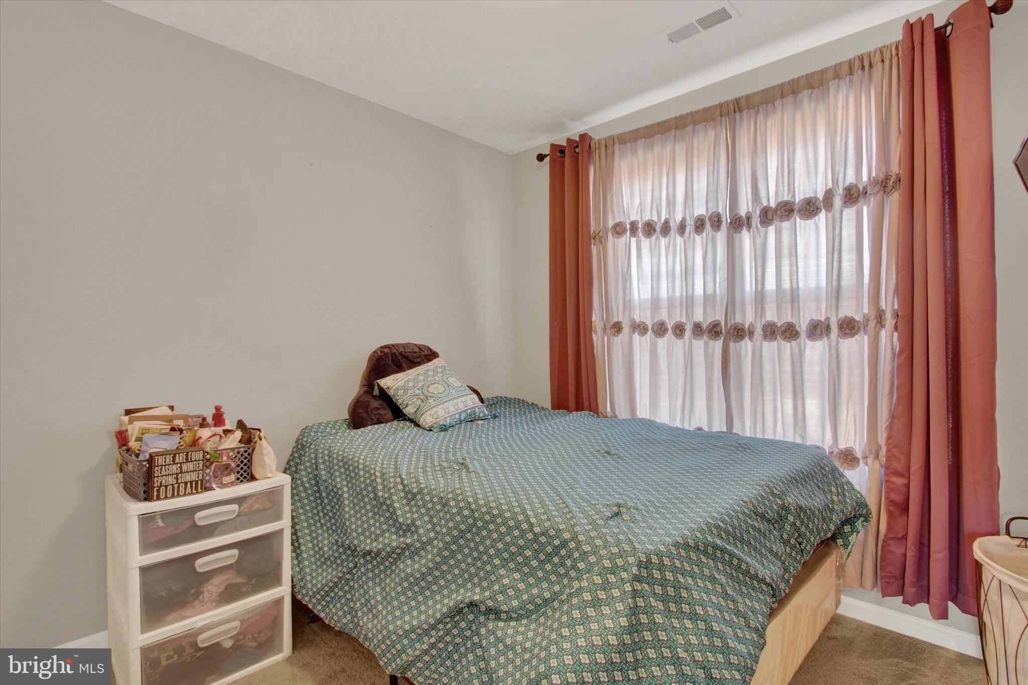 30 Brookside Avenue Hanover, PA 17331 - Photo 20 of 23 a bedroom with a bed and a window