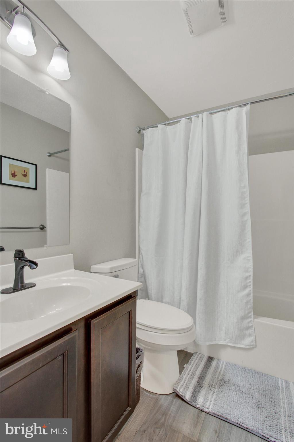 30 Brookside Avenue Hanover, PA 17331 - Photo 21 of 23 a bathroom with a sink a toilet and shower
